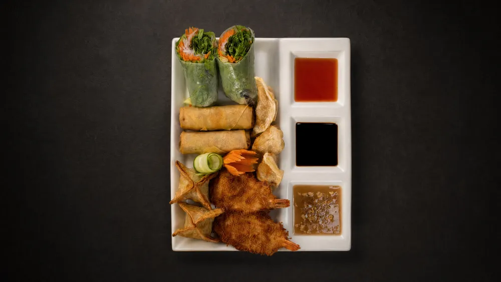 Thai Bistro appetizer platter with fresh rolls, fried spring rolls, crispy wontons and fried shrimp