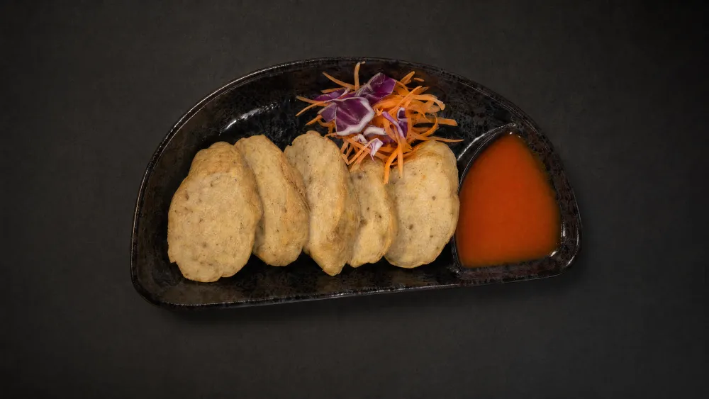 Thai Bistro fish cakes with cabbage-carrot slaw and sweet chili sauce